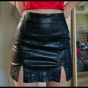 Pleather black skirt with slit details brand:Forever 21 size: M
